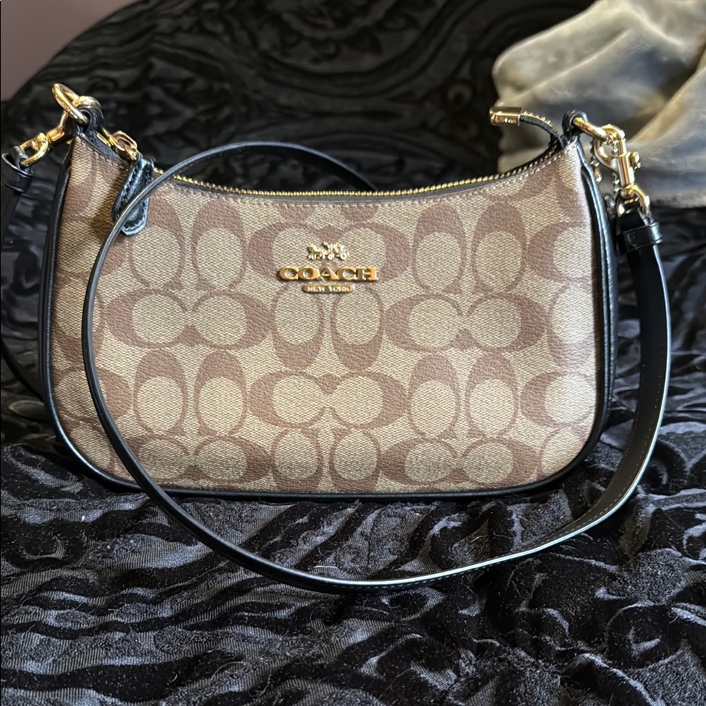 Coach Crossbody Bag with Signature Design